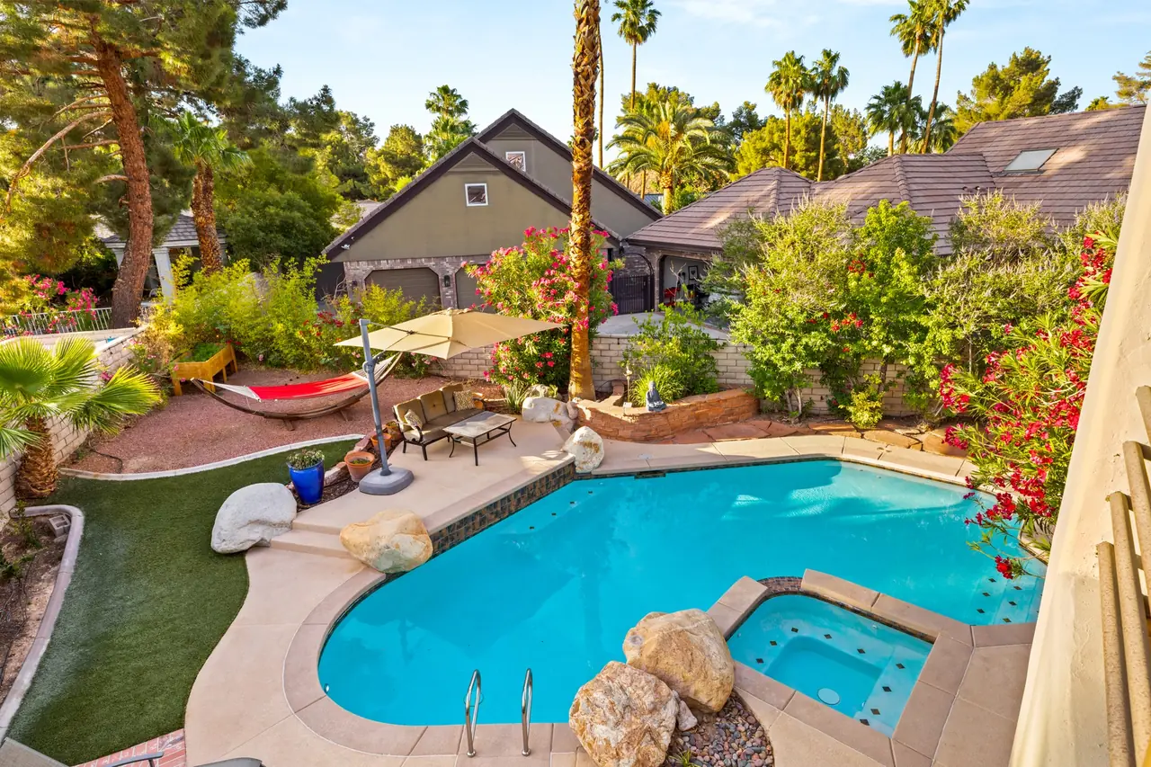 Elevated view of the pool and backyard