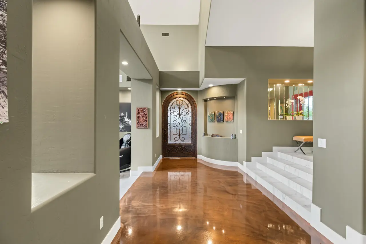 Hall leading to the arched front door