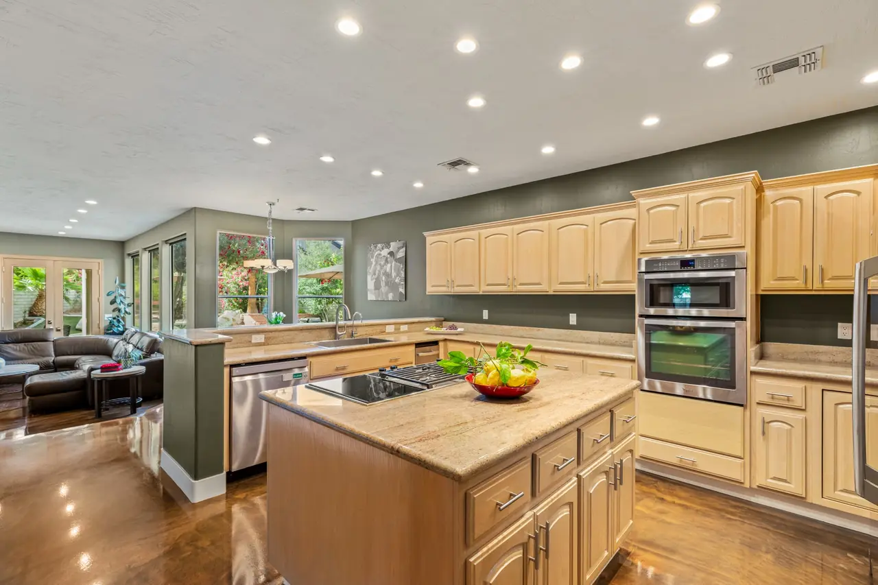 Kitchen with island and stainless appliances