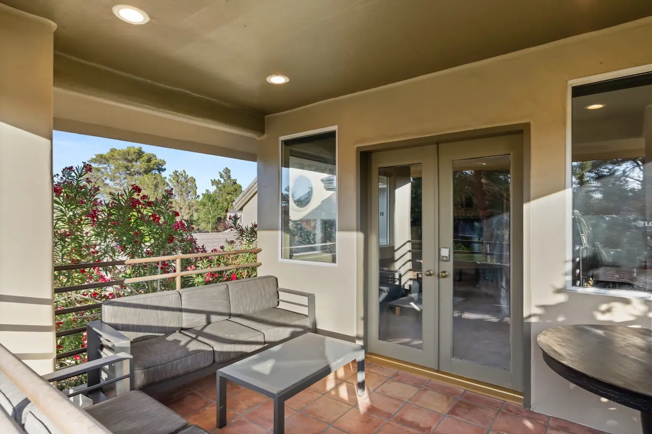 Private covered balcony off the second suite