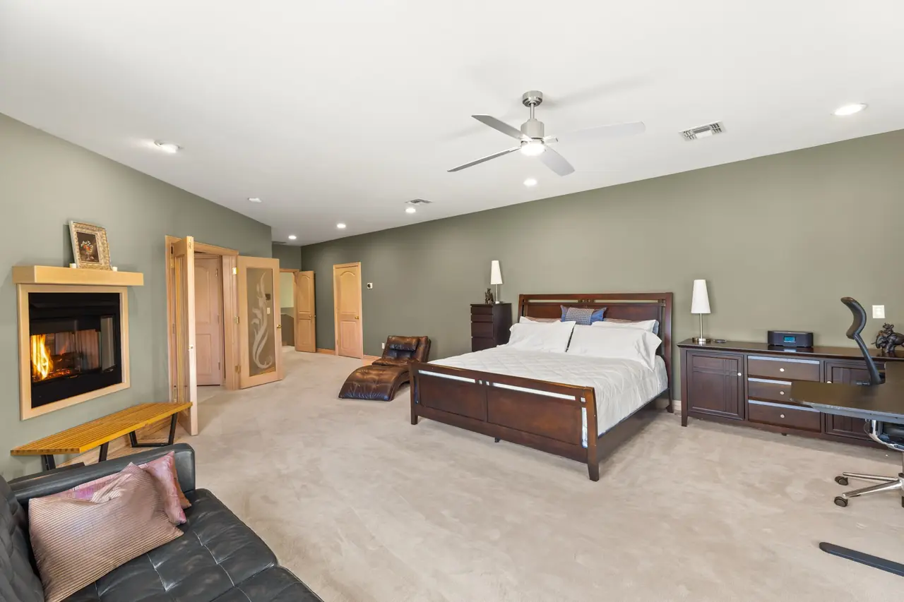 Second suite bedroom with fireplace